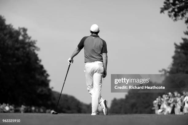 Rory McIlroy of Northern Ireland waits to play his tee shot on the 15th during the third round of the BMW PGA Championship at Wentworth on May 26,...