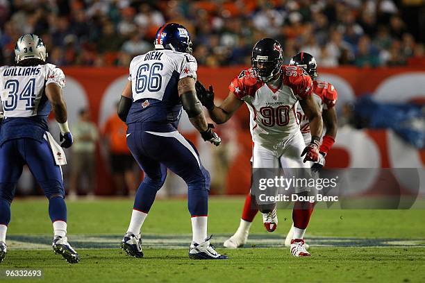 Mario Williams of the Houston Texans in action against David Diehl of the New York Giants plays during the 2010 AFC-NFC Pro Bowl at Sun Life Stadium...