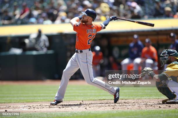 Derek Fisher of the Houston Astros bats during the game against the Oakland Athletics at the Oakland Alameda Coliseum on May 9, 2018 in Oakland,...