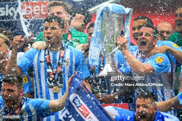 Coventry City players celebrate promotion during the Sky Bet League Two Play Off Final between Coventry City and Exeter City at Wembley Stadium on...