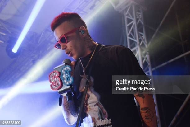 The Italian rapper Sfera Ebbasta, also know as Gionata Boschetti, the 'King of Trap' performing live on stage at Arenile di Bagnoli in Naples, Italy...