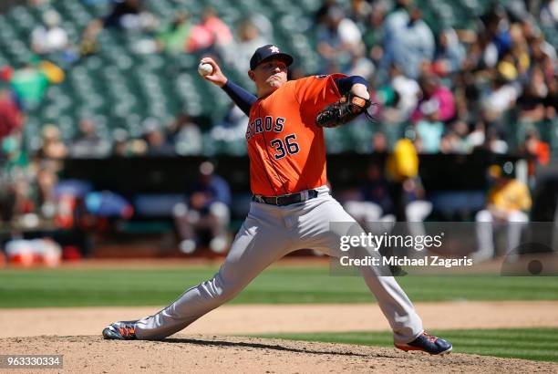 Will Harris of the Houston Astros pitches during the game against the Oakland Athletics at the Oakland Alameda Coliseum on May 9, 2018 in Oakland,...