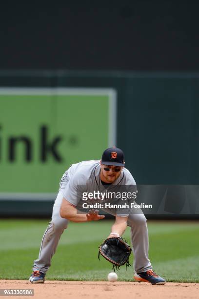 John Hicks of the Detroit Tigers makes a play at first base against the Minnesota Twins during the game on May 23, 2018 at Target Field in...