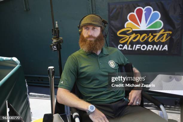 Sports California Analyst Dallas Braden sits behind the plate during the game between the Oakland Athletics and the Houston Astros at the Oakland...