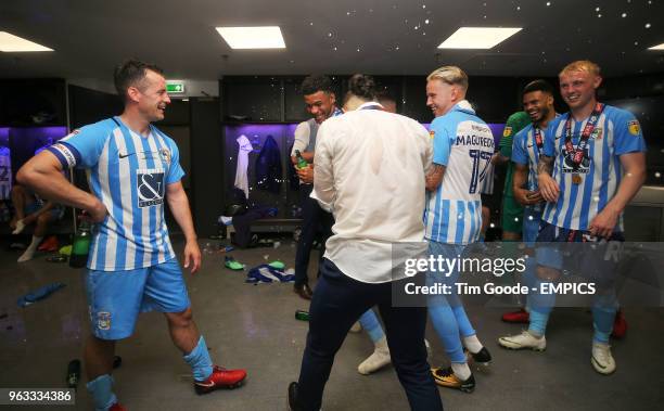 Coventry City's Michael Doyle, Jordan Thompson, Jodi Jones, Jordan Maguire-Drew, Jordan Willis and Jack Grimmer celebrate in the dressing room after...