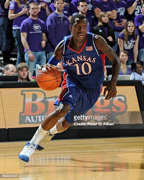 Guard Tyshawn Taylor of the Kansas Jayhawks drives along the baseline in the first half against the Kansas State Wildcats on January 30, 2010 at...