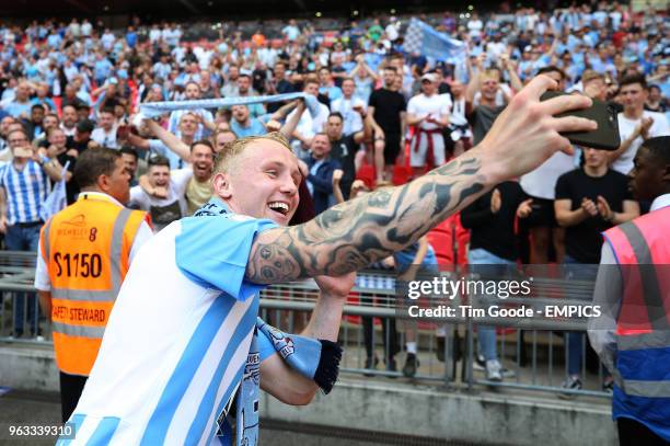 Coventry City's Jack Grimmer celebrates with a selfie after the game Coventry City v Exeter City - Sky Bet League Two - Final - Wembley Stadium .