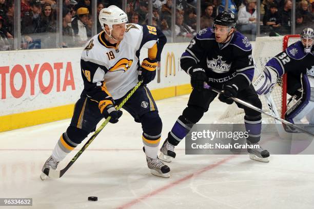 Tim Connolly of the Buffalo Sabres skates with the puck against Jack Johnson of the Los Angeles Kings on January 21, 2010 at Staples Center in Los...