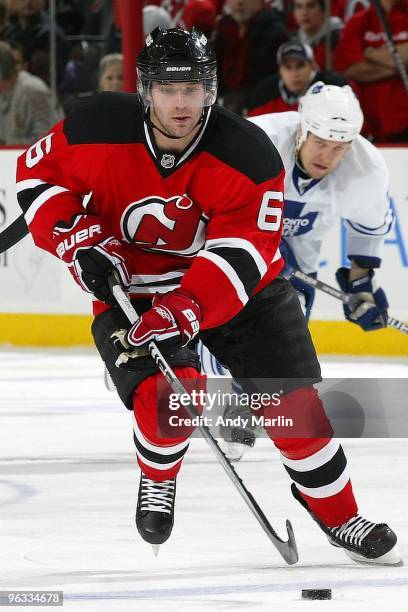 Andy Greene of the New Jersey Devils plays the puck against the Toronto Maple Leafs during their game at the Prudential Center on January 29, 2010 in...