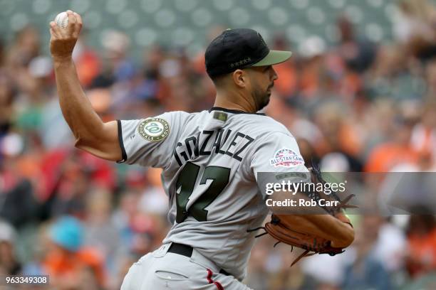 Starting pitcher Gio Gonzalez of the Washington Nationals throws to a Baltimore Orioles batter in the first inning at Oriole Park at Camden Yards on...