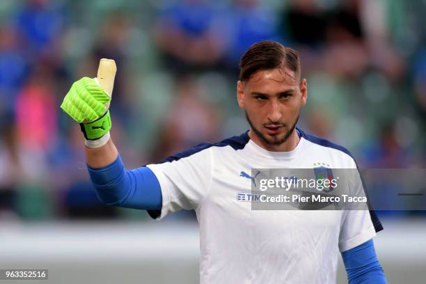 Gianluigi Donnarumma of Italy looks on during warm up of the International Friendly match between Saudi Arabia and Italy on May 28, 2018 in St...