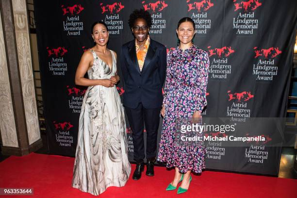 Swedish Minister of Culture and Democracy Alice Bah Kuhnke, Jacqueline Woodson, and Crown Princess Victoria of Sweden pose for a picture during a...