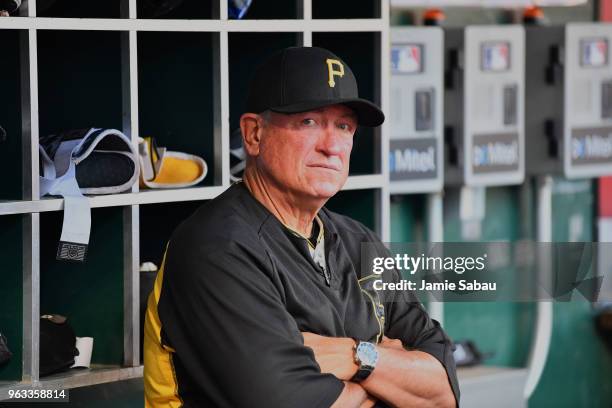 Manager Clint Hurdle of the Pittsburgh Pirates watches his team play against the Cincinnati Reds at Great American Ball Park on May 23, 2018 in...