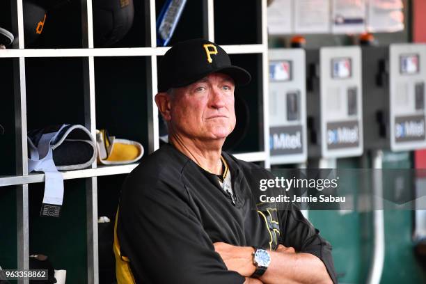 Manager Clint Hurdle of the Pittsburgh Pirates watches his team play against the Cincinnati Reds at Great American Ball Park on May 23, 2018 in...