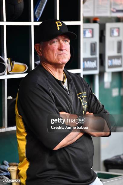 Manager Clint Hurdle of the Pittsburgh Pirates watches his team play against the Cincinnati Reds at Great American Ball Park on May 23, 2018 in...