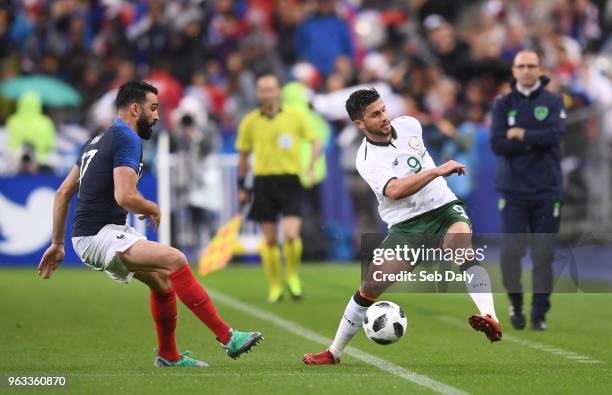 Paris , France - 28 May 2018; Shane Long of Republic of Ireland in action against Adil Rami of France during the International Friendly match between...