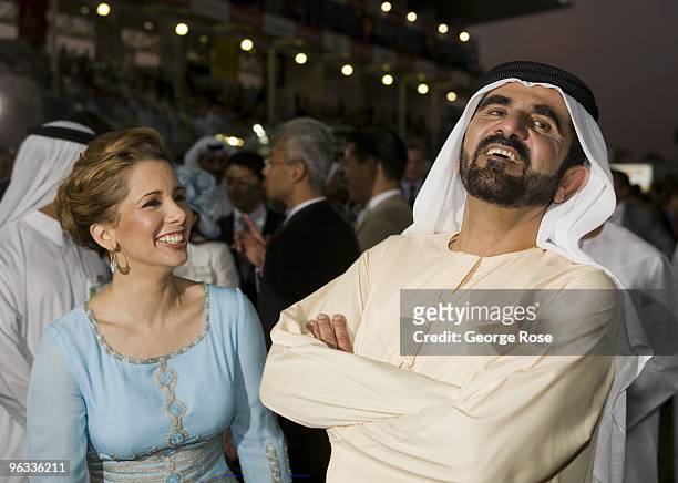 Princess Haya bint Al-Hussein, and her husband, the ruler of Dubai, Sheik Mohammed bin Rashid al-Maktoum, are seen sharing a joke at a public horse...