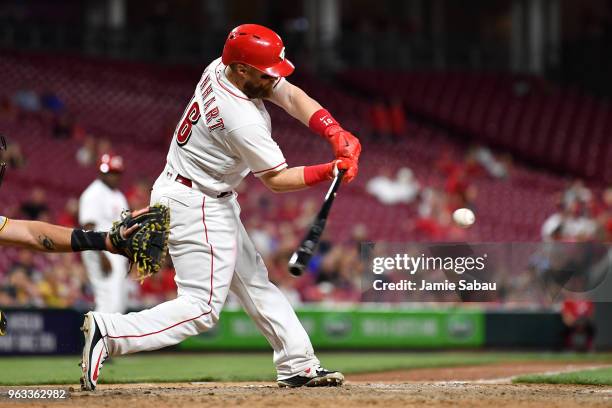 Tucker Barnhart of the Cincinnati Reds bats against the Pittsburgh Pirates at Great American Ball Park on May 23, 2018 in Cincinnati, Ohio. Tucker...