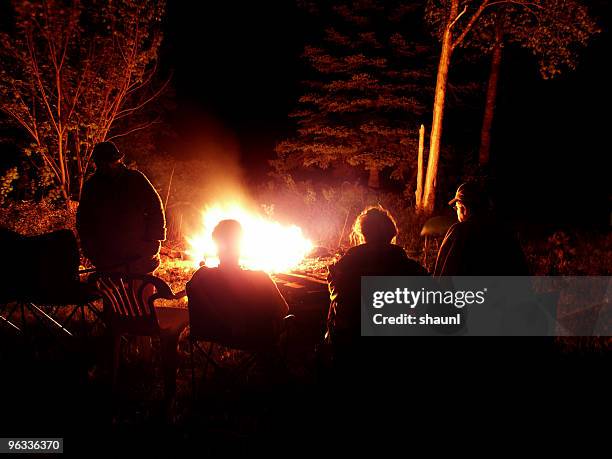 family campfire - bonfire stock pictures, royalty-free photos & images