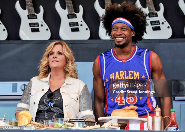 Singer Trisha Yearwood and member of the Harlem Globetrotters attend the William Sonoma Culinary Stage on Day 3 of BottleRock Napa Valley Music...