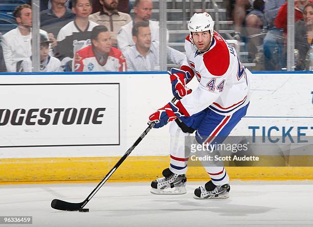 Roman Hamrlik of the Montreal Canadiens skates with the puck against the Tampa Bay Lightning at the St. Pete Times Forum on January 27, 2010 in...