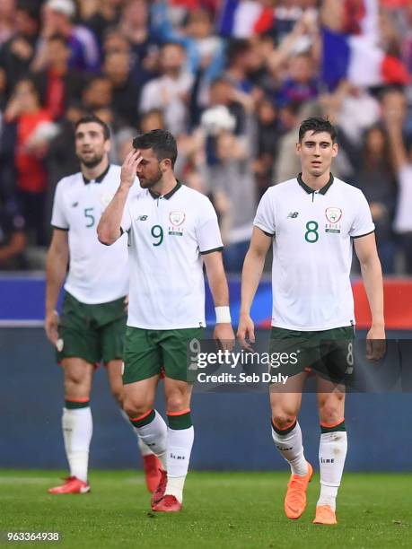 Paris , France - 28 May 2018; Callum O'Dowda, right, Shane Long, centre, and Shane Duffy of Republic of Ireland react after their side conceeded...