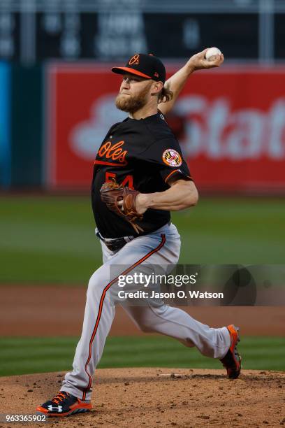 Andrew Cashner of the Baltimore Orioles pitches against the Oakland Athletics during the first inning at the Oakland Coliseum on May 4, 2018 in...