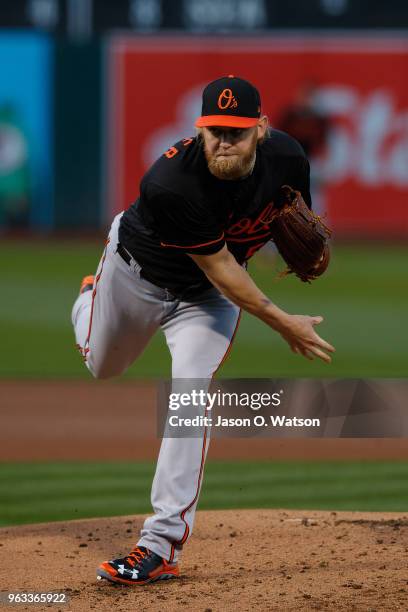 Andrew Cashner of the Baltimore Orioles pitches against the Oakland Athletics during the first inning at the Oakland Coliseum on May 4, 2018 in...