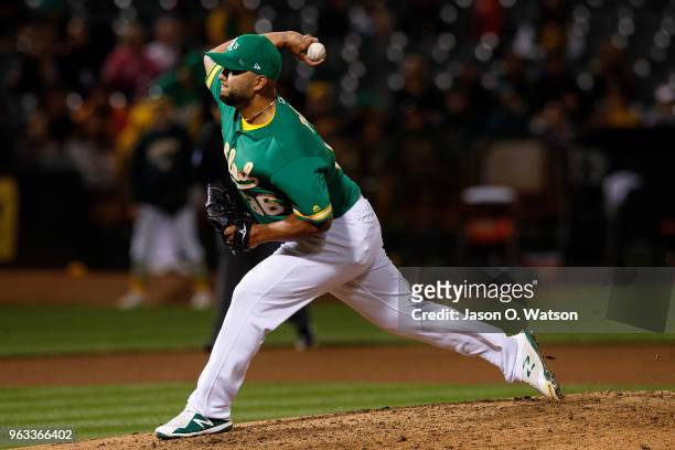 Yusmeiro Petit of the Oakland Athletics pitches against the Baltimore Orioles during the sixth inning at the Oakland Coliseum on May 4, 2018 in...
