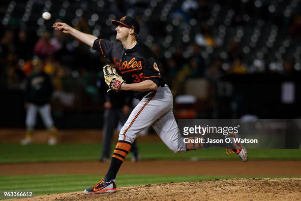 Brad Brach of the Baltimore Orioles pitches against the Oakland Athletics during the fifth inning at the Oakland Coliseum on May 4, 2018 in Oakland,...