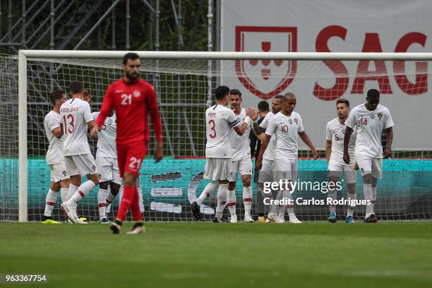 Portugal and AC Milan forward Andre Silva celebrates scoring Portugal's first goal with his team mates during the International Friendly match...