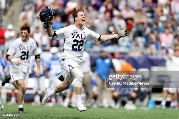 Ryan McQuaide of the Yale Bulldogs celebrates after the Bulldogs defeat the Duke Blue Devils 13-11 in the 2018 NCAA Division I Men's Lacrosse...