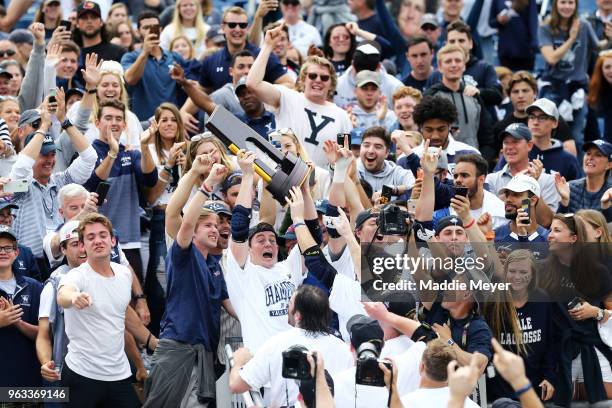 The Yale Bulldogs celebrate with their fans after defeating the Duke Blue Devils 13-11 in the 2018 NCAA Division I Men's Lacrosse Championship game...