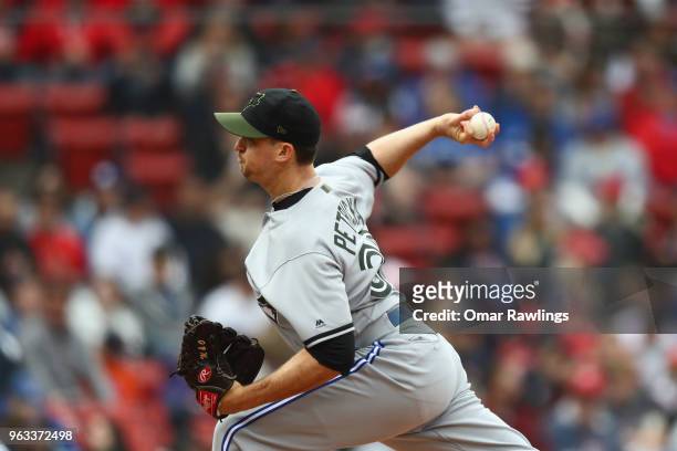 Jake Petricka of the Toronto Blue Jays pitches in the bottom of the eighth inning of the game against the Boston Red Sox at Fenway Park on May 28,...