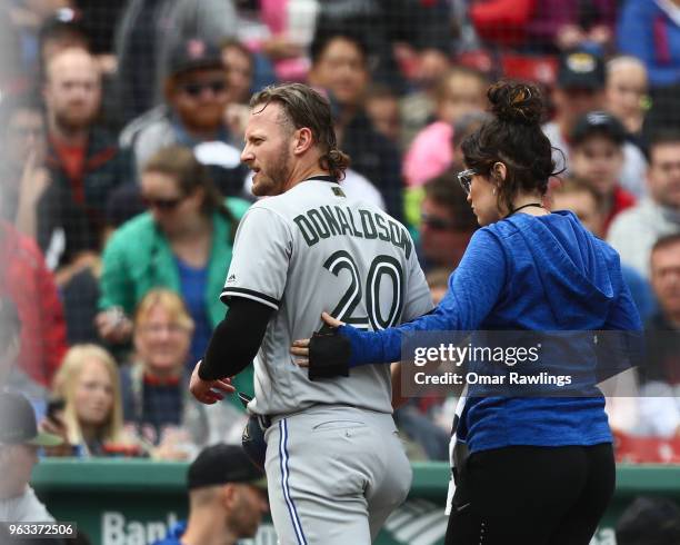 Josh Donaldson of the Toronto Blue Jays leaves the game and is replace by pinch runner Giovanny Urshela of the Toronto Blue Jays in the top of the...