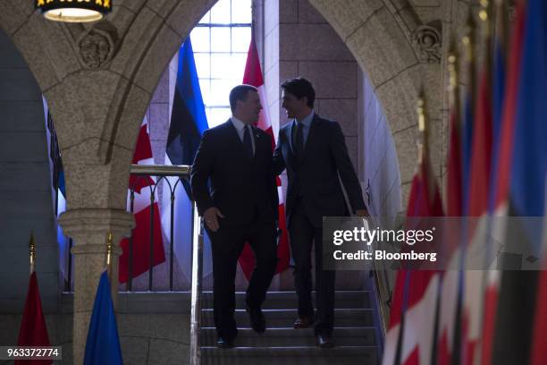 Juri Ratas, Estonia's prime minister, left, and Justin Trudeau, Canada's prime minister, right, arrive for a joint press conference on Parliament...