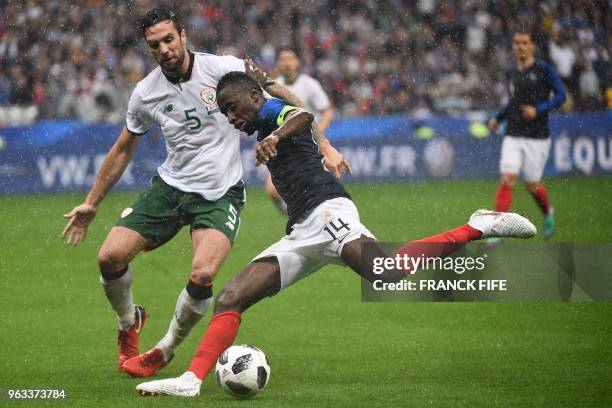 French midfielder Blaise Matuidi vies for the ball with Irish defender Shane Duffy during the friendly football match between France and Ireland at...