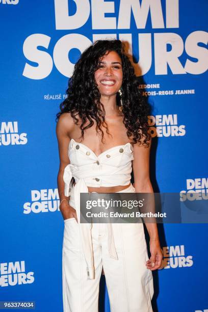 Actress Sabrina Ouazani attends the "Demi Soeurs" Paris Premiere photocall, at Mk2 Bibliotheque on May 28, 2018 in Paris, France.