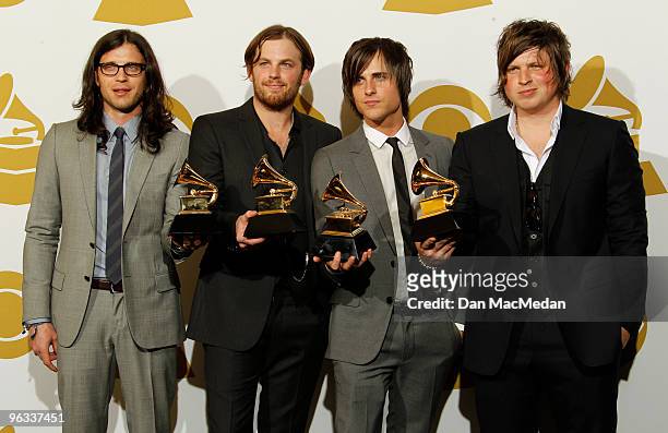Musicians Nathan Followill, Caleb Followill, Jared Followill and Matthew Followill of Kings of Leon pose with their award in the press room at the...