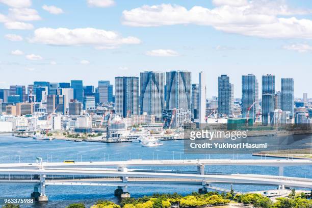 tokyo skyline under the clear blue sky - chuo ward tokyo stock pictures, royalty-free photos & images