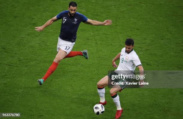 Adil Rami of France in action with Shane Long of Ireland during the International Friendly match between France and Republic of Ireland at Stade de...