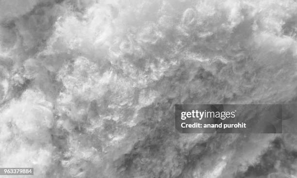 organic raw cotton fiber - background texture - cotton ball stock-fotos und bilder