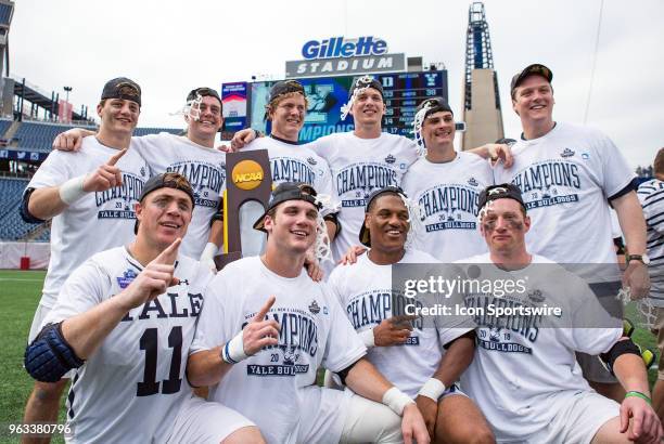 Yale Bulldogs seniors pose for photos at the conclusion of the NCAA Division I Men's Championship match between Duke Blue Devils and Yale Bulldogs on...