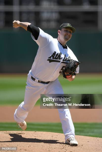 Trevor Cahill of the Oakland Athletics pitches against the Tampa Bay Rays in the top of the first inning at the Oakland Alameda Coliseum on May 28,...