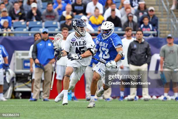 Yale Bulldogs midfielder Jason Alessi and Duke Blue Devils midfielder Sean Cerrone in action during the NCAA Division I Men's Championship match...