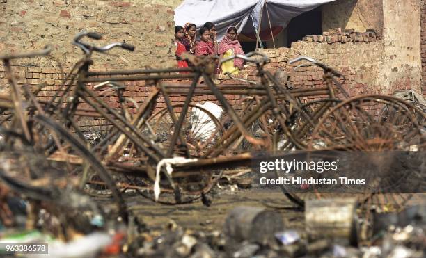 View of the mangled remains after a fire in Barola village destroyed more than 200 shanties on May 28, 2018 in Noida, India.