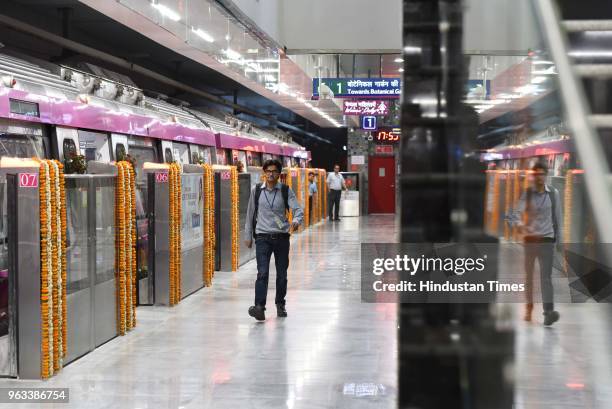 Delhi Metro official is seen at the Nehru Enclave Metro Station after the 25.6 kilometre long Janakpuri West-Kalkaji Mandir Metro corridor was...