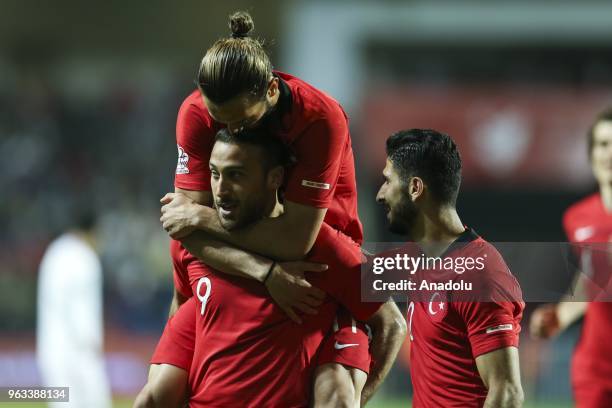 Cenk Tosun of Turkish National Football Team celebrates with teammates after scoring during the international friendly soccer match between Turkey...