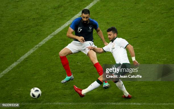 Shane Long of Ireland, Adil Rami of France during the international friendly match between France and Republic of Ireland at Stade de France on May...