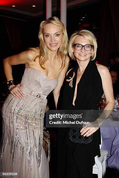 Ina Zobova and Evelina Khromtchenko attend the Sidaction Dinner at Pavillon d'Armenonville on January 28, 2010 in Paris, France.